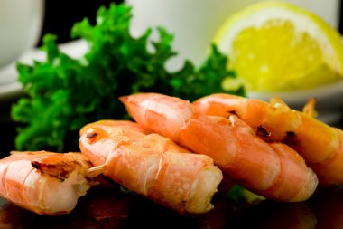 Grilled Prawns on black background clipart