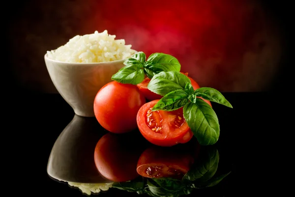 Rijst en tomaten — Stockfoto
