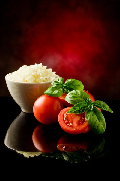 Rice and tomatoes — Stock Photo, Image