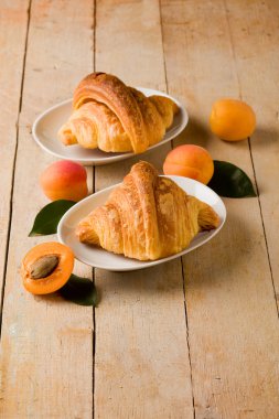 Croissants with apricot marmalade clipart