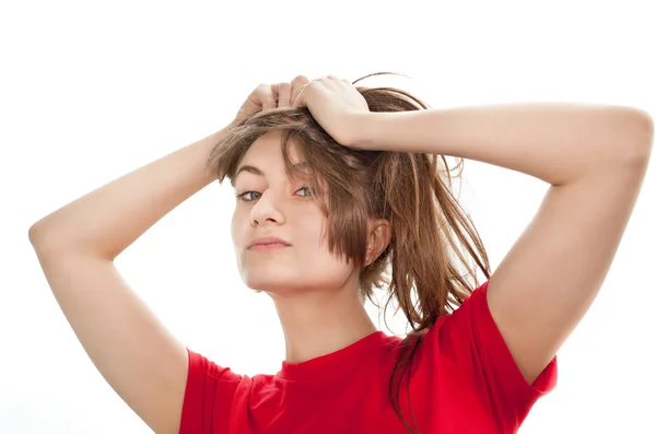 Mujer joven jugando con su jalá cabello —  Fotos de Stock