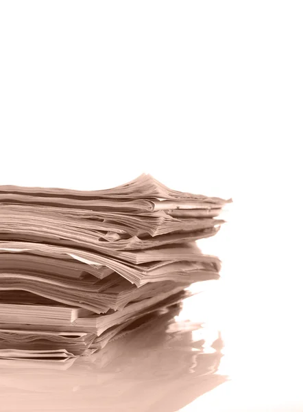 Stack of newspaper on white background close up — Stock Photo, Image