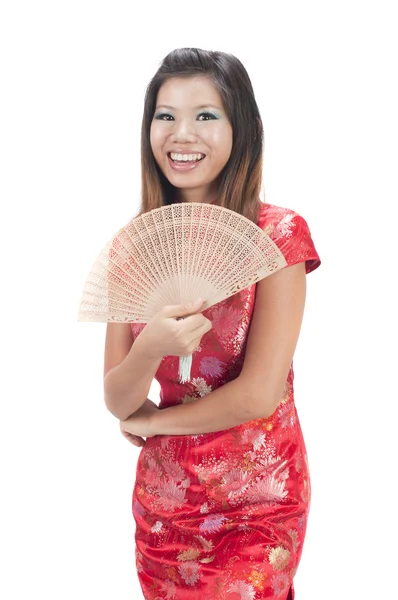 Happy chinese girl with fan duing chinese new year — Stock Photo, Image