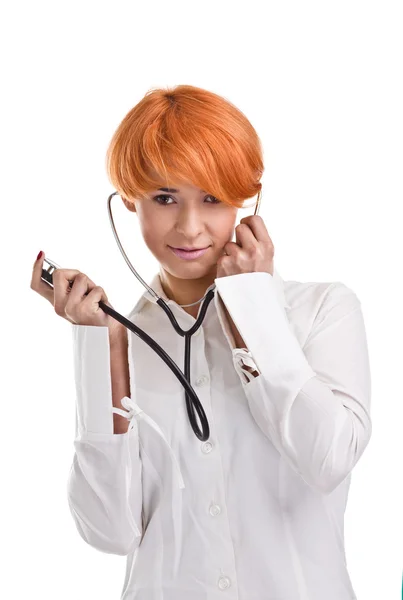 Gyönyörű vörös hajú lány sztetoszkóp — Stock Fotó
