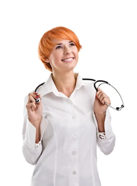 Vacker rödhårig tjej med stetoskop — Stockfoto