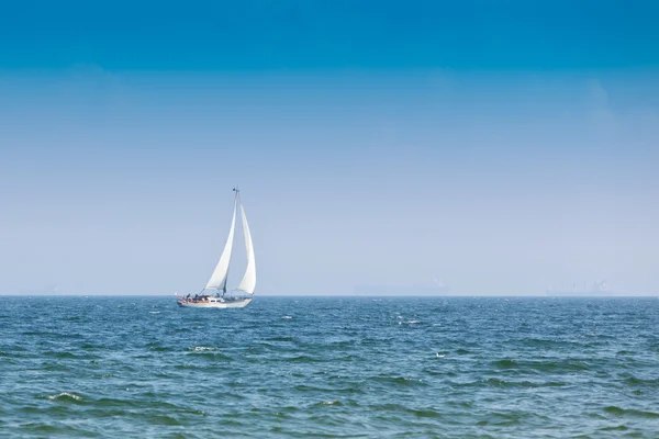 stock image Sailing yacht in the wind