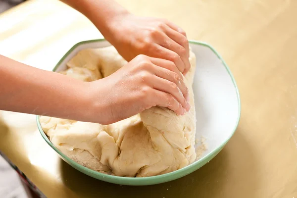 Little boy hands kneading — Stock Photo, Image
