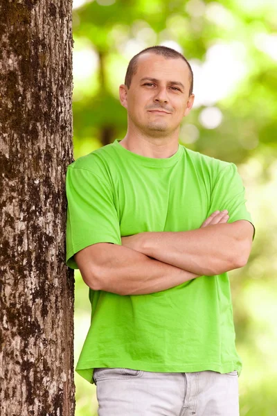 Young man in the forest — Stock Photo, Image