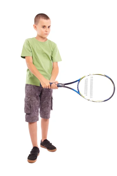 Kind spielt Tennis lizenzfreie Stockbilder