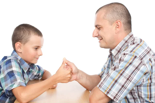 Baba ve oğul thumb güreş — Stok fotoğraf