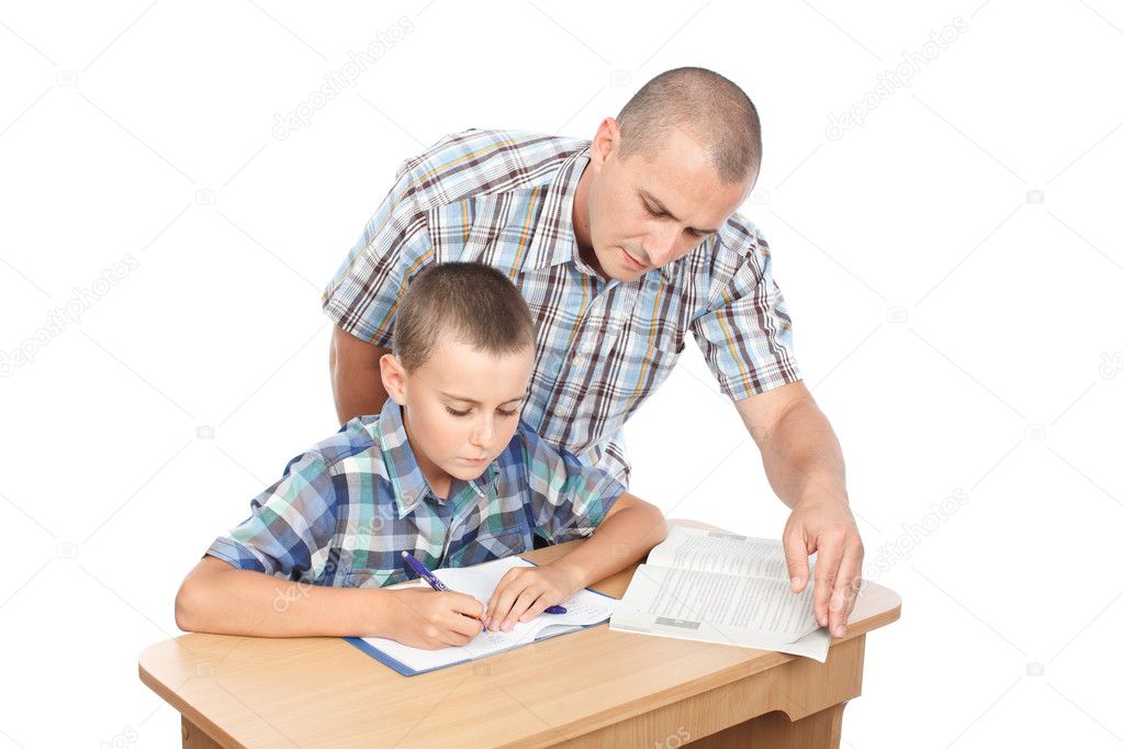 Father verifying son's homework