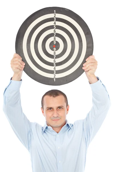 Businessman holding target above his head — Stock Photo, Image