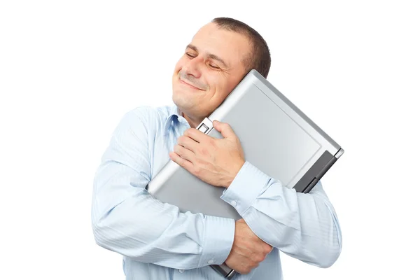 Щасливий бізнесмен тримає свій ноутбук — стокове фото