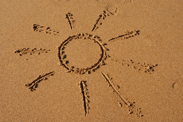 The sun drawn in the sand — Stock Photo, Image