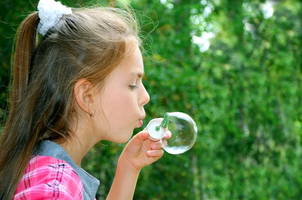 Girl with soap-bubbles — Stock Photo, Image