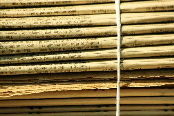 stock image Stacks of newspapers background