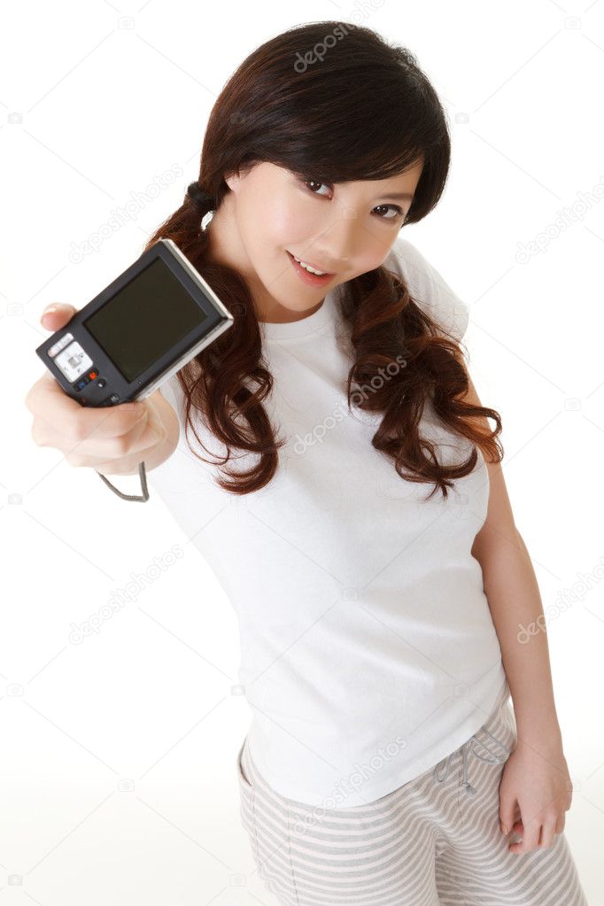 Young lady using digital camera