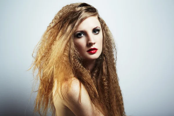 Fashion portrait of a young beautiful redhead woman — Stock Photo, Image