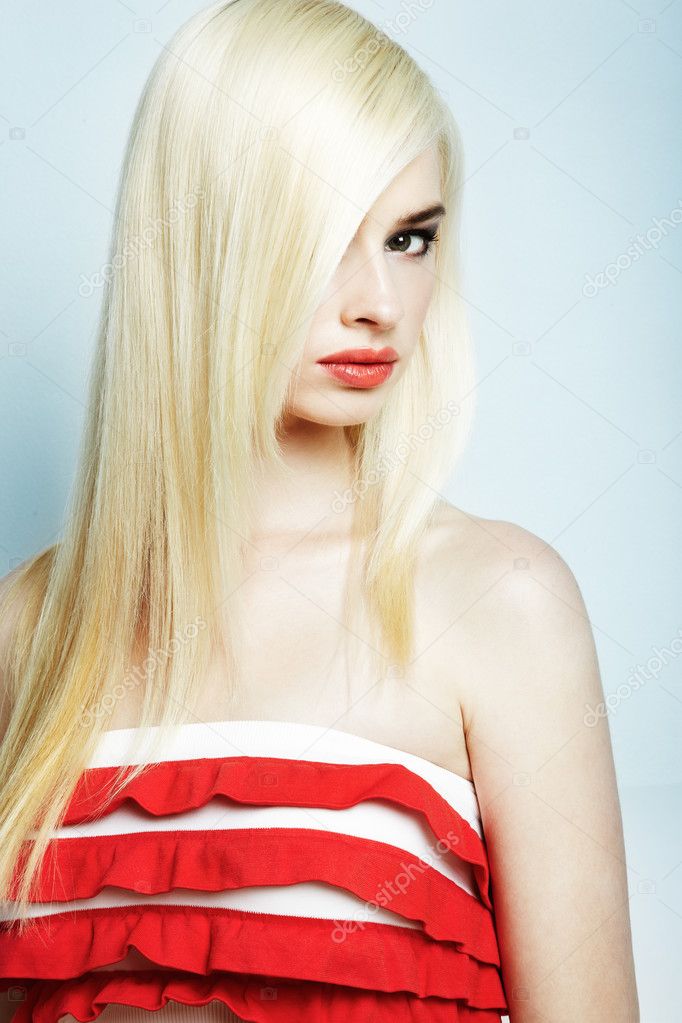Fashion portrait of a young beautiful blonde woman
