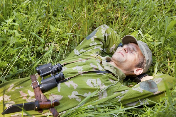 stock image A man dressed in camouflage