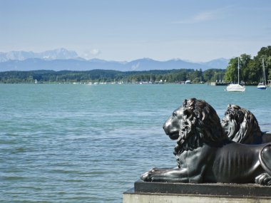 Lions at lake Starnberg clipart