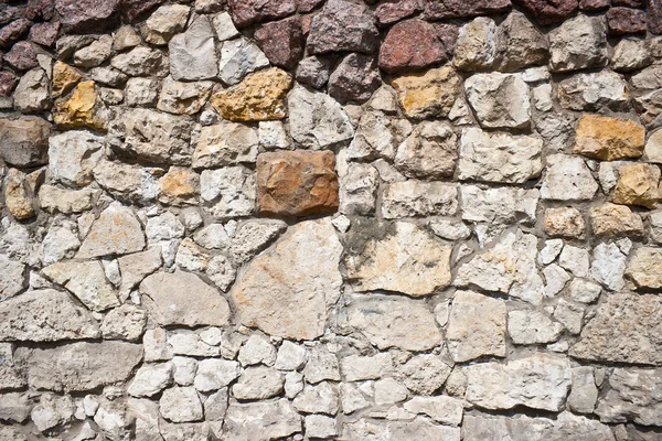 粗糙的石头砌的墙 图库照片
