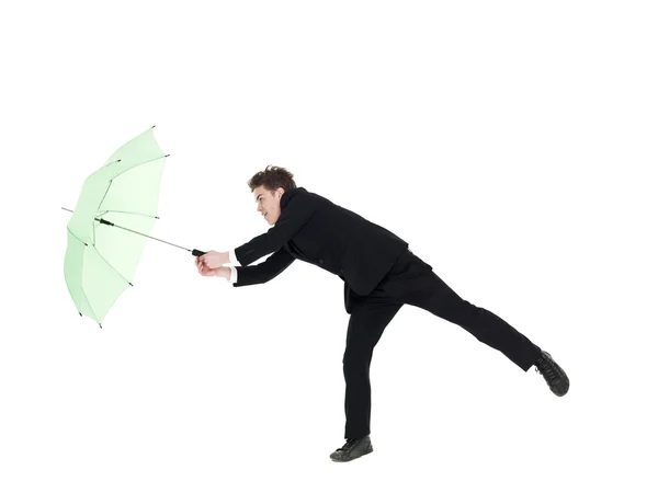 Jongeman met paraplu — Stockfoto