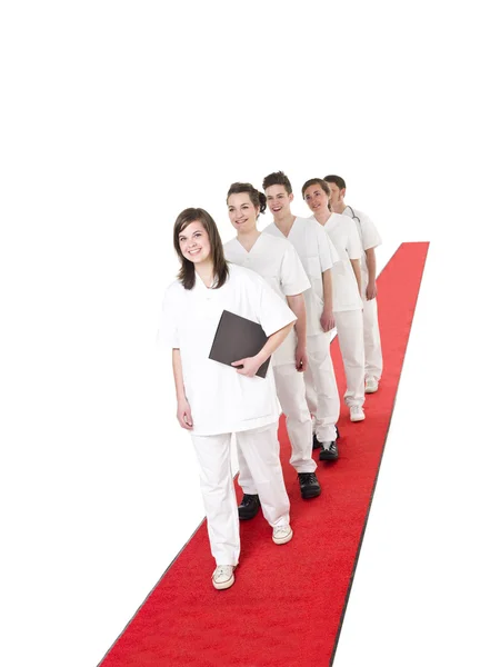 Orvosi csapat a vörös szőnyegen — Stock Fotó