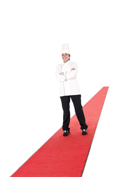 Szef kuchni, stojąc na czerwonym dywanie — Zdjęcie stockowe