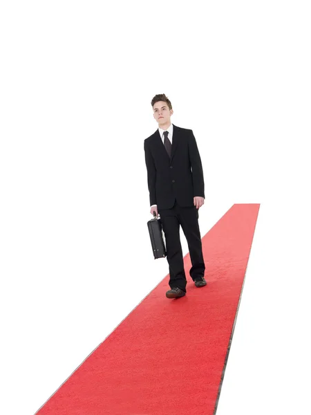 Businessman on a red carpet — Stock Photo, Image