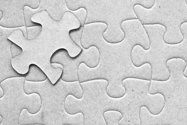Een zwevende stukje van puzzel — Stockfoto