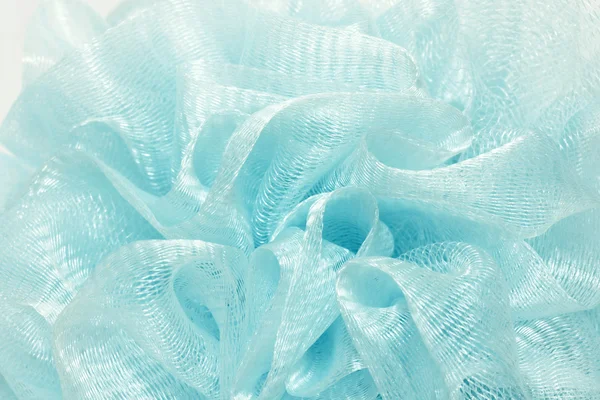 Textured background of blue bath puff — Stock Photo, Image