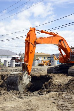 Orange digger and deep hole clipart