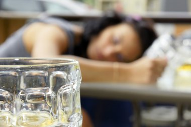 Drunk young woman shallow DOF clipart