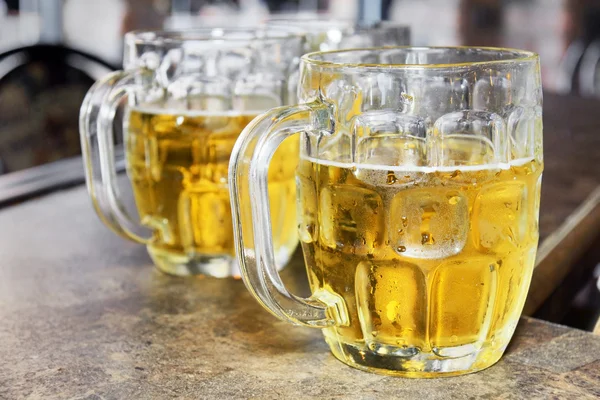 Cold beers in glass bocks — Stock Photo, Image
