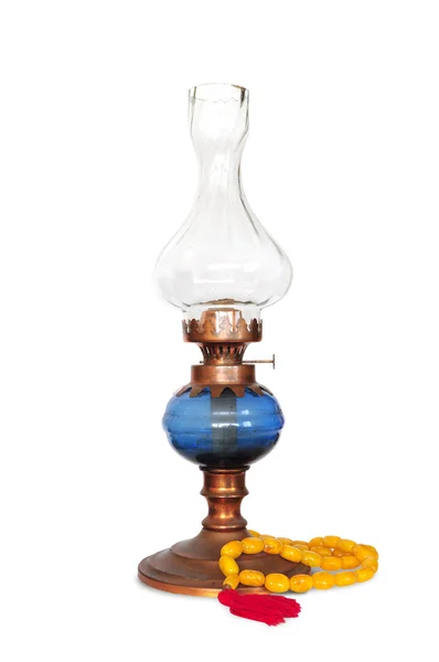 Vintage oriental gas lamp with turkish amber rosary — Stock Photo, Image
