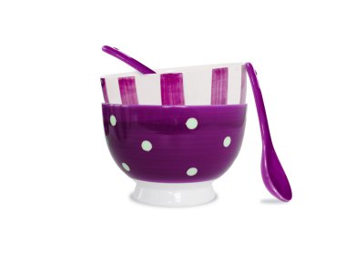 Purple bowls and spoons on white background clipart