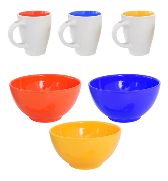 Три разноцветные кружки и чаши — стоковое фото