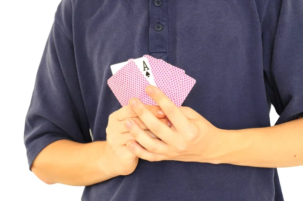 Homem segurando cartas de jogo — Fotografia de Stock