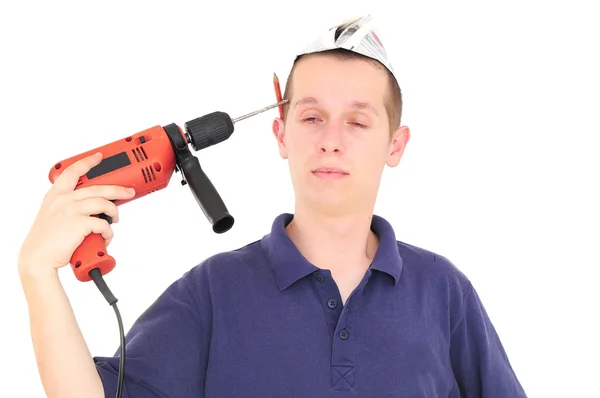 Jovem trabalhador colocando a broca em sua cabeça — Fotografia de Stock