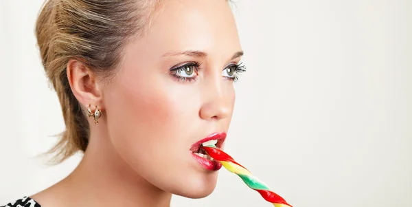 Young woman with lollipop — Stock Photo, Image