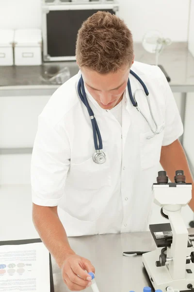 Blond doctor in bio lab — Stock Photo, Image