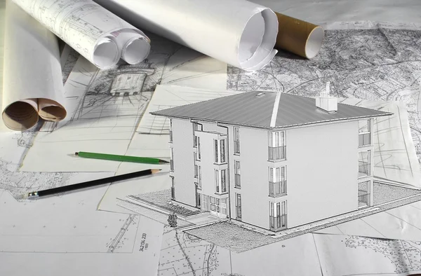 Plans and house — Stock Photo, Image