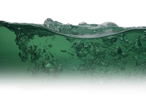 Зелена вода з бульбашок — стокове фото