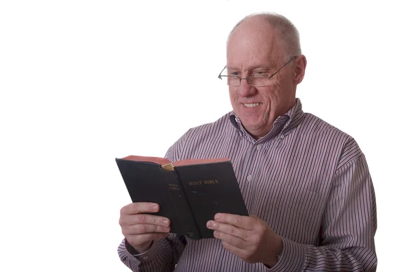 Older Bald Man in Striped Shirt and Glasses Reading Bible — Stock Photo, Image