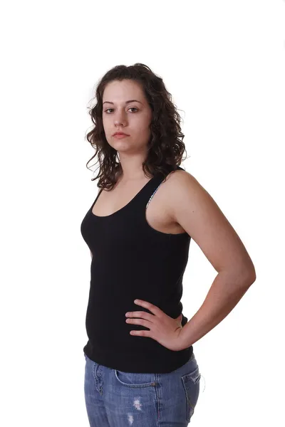 Young Brunette in Black Tank Top with Hands on Hips to Side — Stock Photo, Image