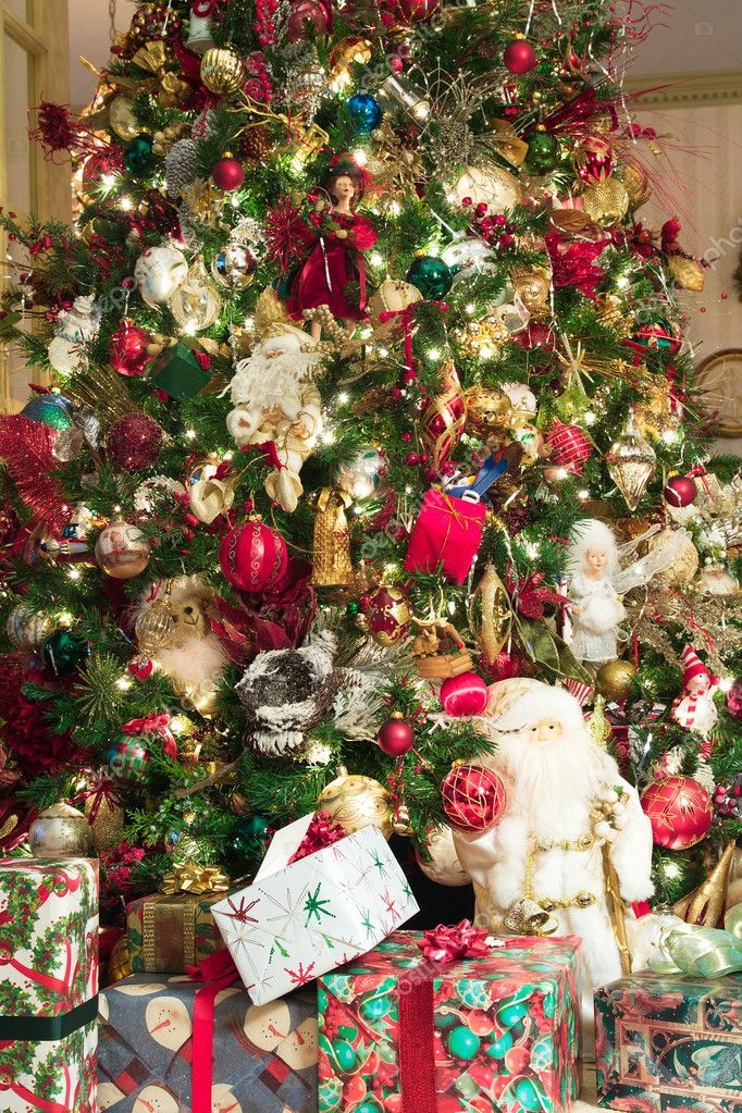 Many Gifts Under Custom Decorated Tree — Stock Photo © dbvirago #5654575