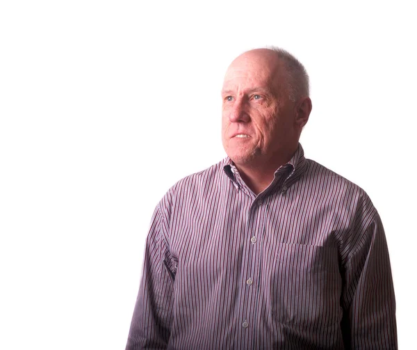 Stock image Older Bald Man in Striped Shirt Looking Up and Away