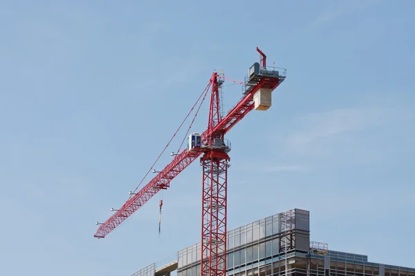 Red Crane on Top of New Construction Site — Stock Photo, Image
