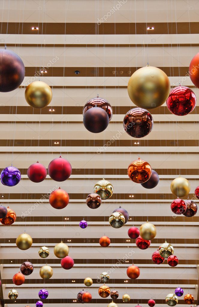 Colorful Christmas Decorations Hanging From Ceiling Stock